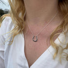 Sterling Silver Classic Horseshoe Necklace with Cubic Zirconia