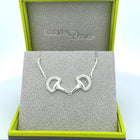 Silver necklace with horse bit design in a Reeves box