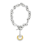 Silver chain bracelet with a gold horse bit charm on a white background