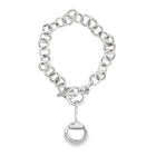 Silver chain bracelet with a horse bit charm on a white background